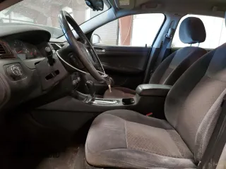 2012 Chevrolet Impala LT Retail with VIN 2G1WB5E33C1115472, listed as a Copart auction lot 54706825 with 283,656 mi miles and Clean Title. Bid and sale history available at DreamBid. Image 7.