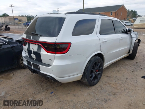 2021 Dodge Durango R/T with VIN 1C4SDJCT5MC549058, listed as a IAAI auction lot 41847281 with 99,556 mi miles and . Bid and sale history available at DreamBid. Image 4.