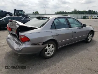 2000 Honda Accord EX z VIN 1HGCG5656YA060963, wystawiony jako Copart lot #54715235 z przebiegiem 266 918 mil mil oraz Szkoda całkowita • Salvage title. Historia ofert i sprzedaży dostępna na DreamBid. Obrazek 3.