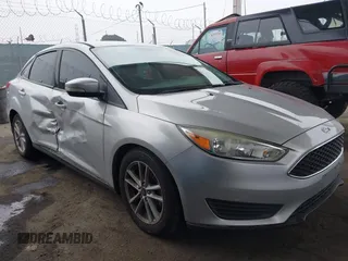 2015 Ford Focus SE z VIN 1FADP3F28FL327458, wystawiony jako IAAI lot #42444301 z przebiegiem 116 709 mil mil oraz . Historia ofert i sprzedaży dostępna na DreamBid. Obrazek 1.