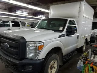 2016 Ford Super Duty F-250 SRW XL with VIN 1FDBF2B65GED17530, listed as a IAAI auction lot 42109214 with 400,975 mi miles. Bid and sale history available at carsss.com. Image 1.