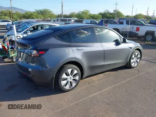 2023 Tesla Model Y Long Range with VIN 7SAYGDEE0PF928836, listed as a IAAI auction lot 41538742 with 9,630 mi miles and . Bid and sale history available at DreamBid. Image 4.