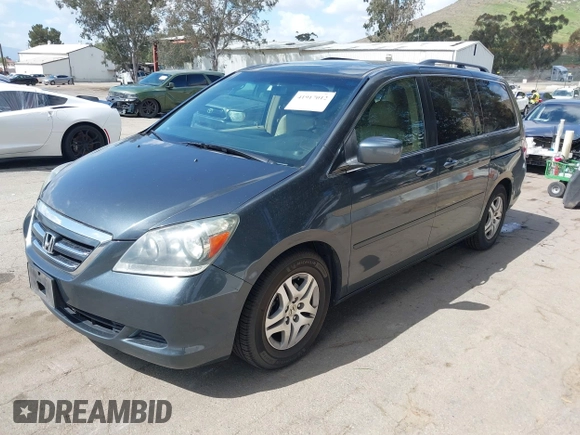 2005 Honda Odyssey EX-L with VIN 5FNRL38725B084980, listed as a IAAI auction lot 41917012 with 134,685 mi miles. Bid and sale history available at carsss.com. Image 2.
