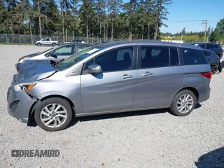 2014 Mazda 5 Sport z VIN JM1CW2BL0E0172678, wystawiony jako IAAI lot #42192057 z przebiegiem 89 848 mil mil oraz . Historia ofert i sprzedaży dostępna na DreamBid. Obrazek 14.