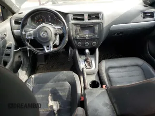 2014 Volkswagen Jetta GLI Edition 30 with VIN 3VW4S7AJ6EM211054, listed as a Copart auction lot 62810235 with 151,382 mi miles and Salvage title. Bid and sale history available at DreamBid. Image 8.