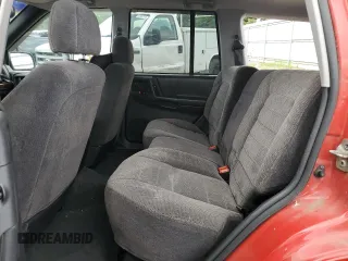 1997 Jeep Grand Cherokee Laredo with VIN 1J4GZ58S8VC601342, listed as a Copart auction lot 65360204 with 139,036 mi miles and Salvage Title. Bid and sale history available at carsss.com. Image 11.