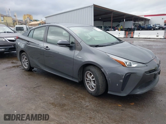 2021 Toyota Prius L Eco with VIN JTDKAMFUXM3143646, listed as a IAAI auction lot 41507110 with 207,238 mi miles. Bid and sale history available at carsss.com. Image 1.