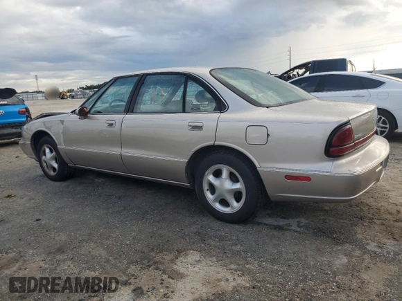1997 Oldsmobile LSS z VIN 1G3HY52K9V4823565, wystawiony jako Copart lot #73965744 z przebiegiem 74 973 mil mil oraz Szkody całkowita. Historia ofert i sprzedaży dostępna na DreamBid. Obrazek 2.