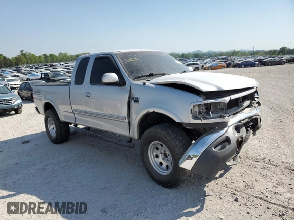 2000 Ford F-150 XL with VIN 1FTRX18L8YNB58706, listed as a Copart auction lot 53243215 with 0 mi miles and Salvage Title. Bid and sale history available at carsss.com. Image 4.