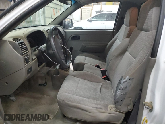 2006 Chevrolet Colorado Work Truck z VIN 1GCCS148268238603, wystawiony jako Copart lot #41386645 z przebiegiem 150 781 mil mil oraz Szkoda całkowita • Salvage title. Historia ofert i sprzedaży dostępna na DreamBid. Obrazek 7.