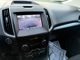 2020 Ford Edge SE с VIN 2FMPK3G9XLBB11099, выставлен на аукционе Copart как лот 66417805 с пробегом 119 223 миль миль и Чистый • Clean title. История ставок и продаж доступна на DreamBid. Изображение 12.
