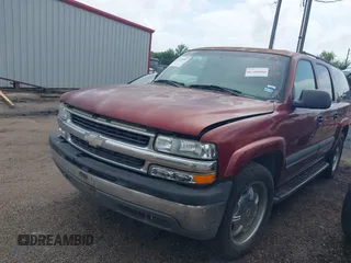 2002 Chevrolet Suburban LT z VIN 1GNEC16Z72J252681, wystawiony jako IAAI lot #42375392 z przebiegiem 312 135 mil mil oraz . Historia ofert i sprzedaży dostępna na DreamBid. Obrazek 2.