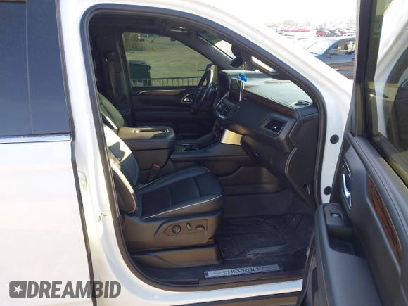 2022 Chevrolet Suburban Premier with VIN 1GNSCFKDXNR121180, listed as a IAAI auction lot 41833036 with 86,085 mi miles and . Bid and sale history available at DreamBid. Image 5.