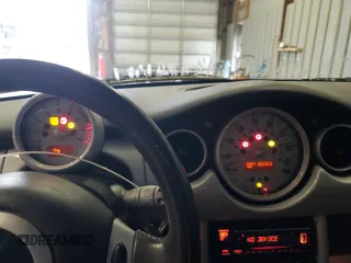 2002 MINI Hardtop with VIN WMWRC33452TC35333, listed as a Copart auction lot 44447425 with 166,353 mi miles and Salvage Title. Bid and sale history available at DreamBid. Image 9.