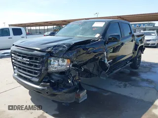2022 GMC Canyon 2WD Elevation with VIN 1GTG5CEN5N1151794, listed as a IAAI auction lot 41876656 with 57,305 mi miles. Bid and sale history available at carsss.com. Image 6.