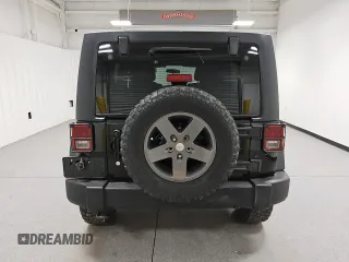 2011 Jeep Wrangler Unlimited Rubicon with VIN 1J4HA6H16BL551870, listed as a Copart auction lot 56754715 with 154,890 mi miles and Clean title. Bid and sale history available at DreamBid. Image 6.