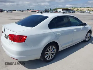 2014 Volkswagen Jetta SE with VIN 3VWD07AJ2EM444256, listed as a IAAI auction lot 42383287 with 99,654 mi miles and . Bid and sale history available at DreamBid. Image 4.