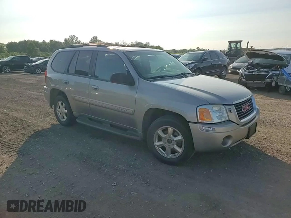 2002 GMC Envoy SLT with VIN 1GKDT13S322420861, listed as a Copart auction lot 63408164 with 250,167 mi miles and Salvage Title. Bid and sale history available at DreamBid. Image 11.