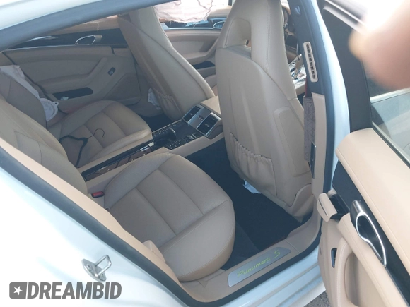 2014 Porsche Panamera S E-Hybrid with VIN WP0AD2A76EL044722, listed as a IAAI auction lot 40716615 with 52,474 mi miles and . Bid and sale history available at DreamBid. Image 8.