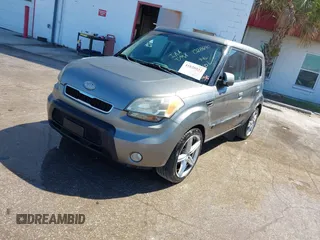 2010 Kia Soul + with VIN KNDJT2A29A7028640, listed as a IAAI auction lot 41820532 with 303,975 mi miles. Bid and sale history available at carsss.com. Image 2.