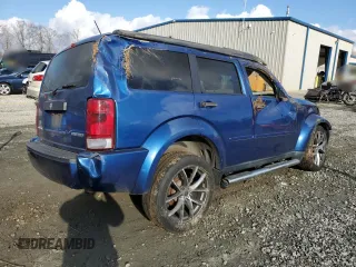 2010 Dodge Nitro Heat with VIN 1D4PT4GK7AW158275, listed as a Copart auction lot 85861784 with 243,809 mi miles and Salvage title. Bid and sale history available at DreamBid. Image 3.