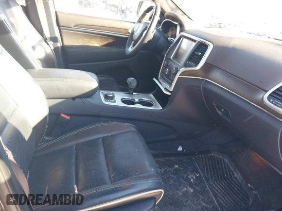 2015 Jeep Grand Cherokee Overland z VIN 1C4RJFCG3FC726748, wystawiony jako IAAI lot #41369715 z przebiegiem 120 905 mil mil oraz . Historia ofert i sprzedaży dostępna na DreamBid. Obrazek 5.