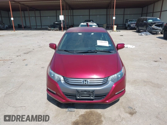 2010 Honda Insight EX with VIN JHMZE2H73AS009253, listed as a IAAI auction lot 41882569 with 104,839 mi miles and . Bid and sale history available at DreamBid. Image 13.