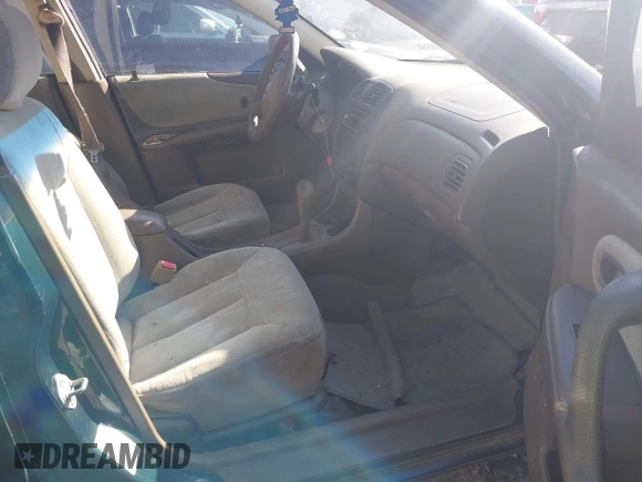2000 Mazda Protege DX with VIN JM1BJ2229Y0235881, listed as a IAAI auction lot 41484779 with 283,054 mi miles and . Bid and sale history available at DreamBid. Image 5.