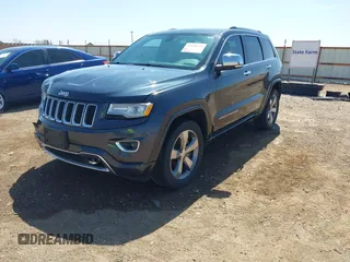 2015 Jeep Grand Cherokee Overland with VIN 1C4RJECG3FC635327, listed as a IAAI auction lot 41910559 with 118,519 mi miles and . Bid and sale history available at DreamBid. Image 17.