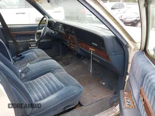 1990 Chevrolet Caprice z VIN 1G1BU54E9LA105479, wystawiony jako IAAI lot #42277687 z przebiegiem 30 947 mil mil oraz . Historia ofert i sprzedaży dostępna na DreamBid. Obrazek 5.