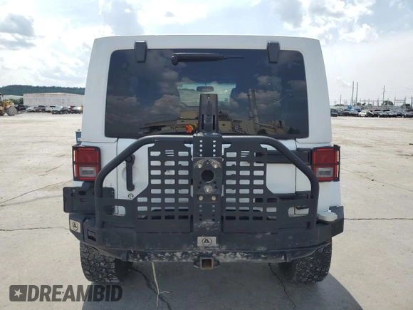 2015 Jeep Wrangler Unlimited Rubicon with VIN 1C4BJWFG8FL561308, listed as a Copart auction lot 60233385 with 208,224 mi miles and Clean title. Bid and sale history available at DreamBid. Image 6.