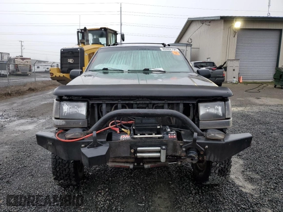 1998 Jeep Grand Cherokee Laredo with VIN 1J4GZ48S0WC171138, listed as a Copart auction lot 85502794 with 0 mi miles and Salvage Title. Bid and sale history available at carsss.com. Image 5.