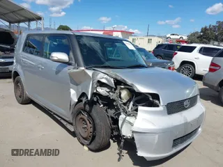 2009 Scion xB with VIN JTLKE50E991081756, listed as a IAAI auction lot 41952232 with 167,079 mi miles. Bid and sale history available at carsss.com. Image 1.