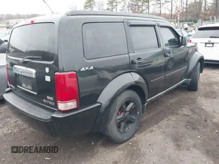 2009 Dodge Nitro SLT with VIN 1D8GU58K19W525618, listed as a IAAI auction lot 41726192 with 999,999 mi miles. Bid and sale history available at carsss.com. Image 4.