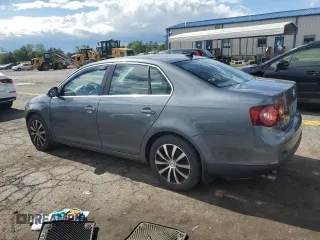 2009 Volkswagen Jetta SE with VIN 3VWRZ71K79M168084, listed as a Copart auction lot 57854825 with 150,986 mi miles and Salvage title. Bid and sale history available at DreamBid. Image 2.