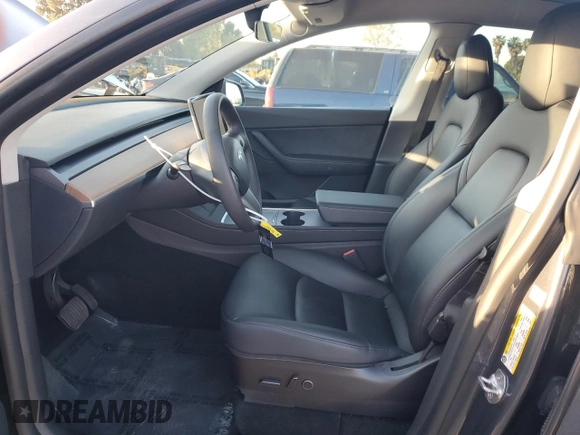 2022 Tesla Model Y Long Range z VIN 7SAYGAEE9NF366382, wystawiony jako Copart lot #52179515 z przebiegiem 41 654 mil mil oraz Szkoda całkowita • Salvage title. Historia ofert i sprzedaży dostępna na DreamBid. Obrazek 7.