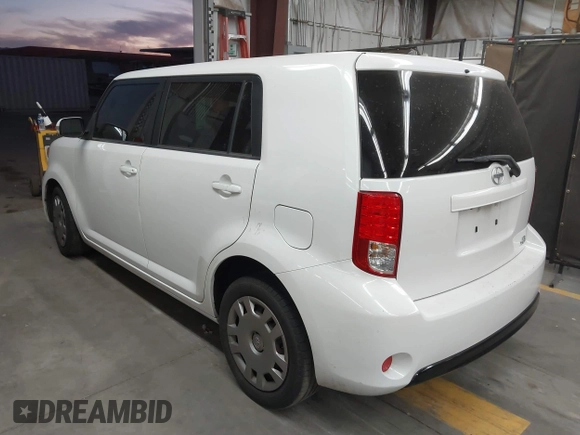 2014 Scion xB with VIN JTLZE4FE1EJ060281, listed as a IAAI auction lot 41477386 with 61,423 mi miles. Bid and sale history available at carsss.com. Image 3.