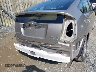 2004 Toyota Prius z VIN JTDKB22U040116044, wystawiony jako IAAI lot #42533237 z przebiegiem Nie podano mil oraz . Historia ofert i sprzedaży dostępna na DreamBid. Obrazek 14.