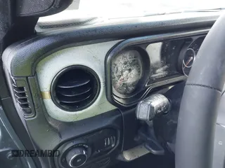 2024 Jeep Wrangler Sport S with VIN 1C4PJXDN2RW306332, listed as a IAAI auction lot 41036573 with 1,785 mi miles and . Bid and sale history available at DreamBid. Image 18.