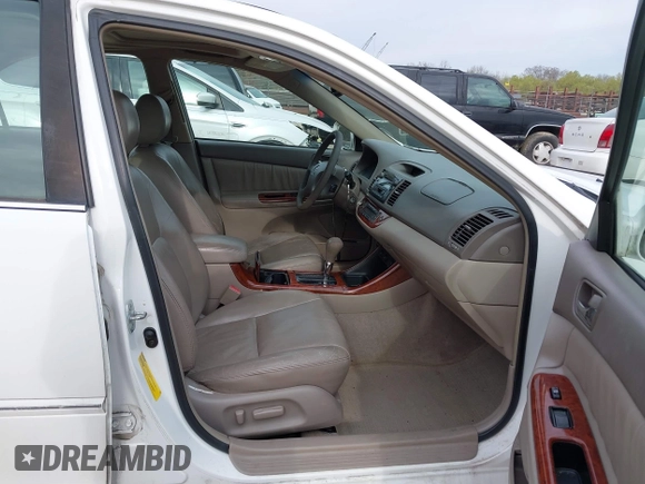 2003 Toyota Camry LE with VIN 4T1BE30K73U227420, listed as a IAAI auction lot 41838940 with 213,470 mi miles and . Bid and sale history available at DreamBid. Image 5.
