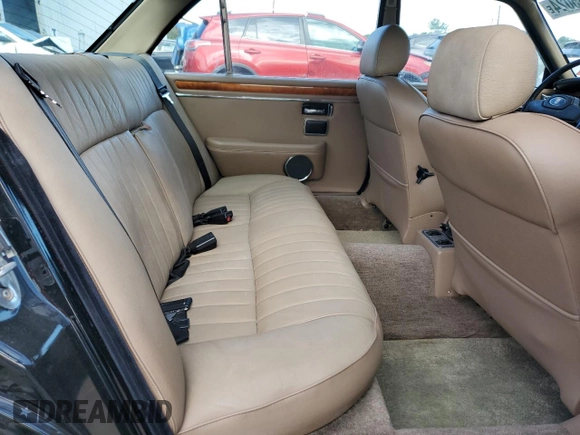 1986 Jaguar XJ z VIN SAJAV1341GC458926, wystawiony jako Copart lot #73985024 z przebiegiem 73 337 mil mil oraz Czysty tytuł • Clean title. Historia ofert i sprzedaży dostępna na DreamBid. Obrazek 10.