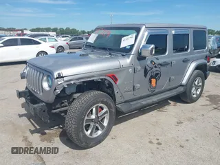 2018 Jeep Wrangler Unlimited Sahara with VIN 1C4HJXEG4JW115522, listed as a IAAI auction lot 42322791 with 68,409 mi miles and . Bid and sale history available at DreamBid. Image 17.