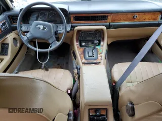 1989 Jaguar XJ with VIN SAJHY1540KC578115, listed as a Copart auction lot 69142274 with Not Provided miles and Clean Title. Bid and sale history available at DreamBid. Image 8.