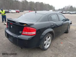 2008 Dodge Avenger SXT with VIN 1B3LC56R08N148298, listed as a IAAI auction lot 41618162 with 142,027 mi miles. Bid and sale history available at carsss.com. Image 4.