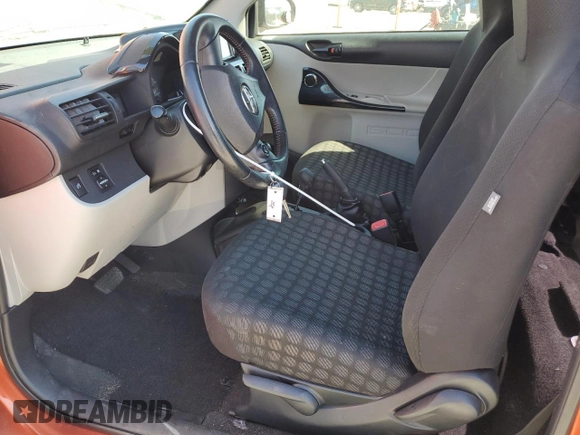 2013 Scion iQ z VIN JTNJJXB01DJ022124, wystawiony jako Copart lot #47960265 z przebiegiem 95 551 mil mil oraz Szkoda całkowita • Salvage title. Historia ofert i sprzedaży dostępna na DreamBid. Obrazek 7.