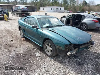 1996 Ford Mustang with VIN 1FALP4041TF145381, listed as a IAAI auction lot 41754114 with 185,072 mi miles. Bid and sale history available at carsss.com. Image 1.