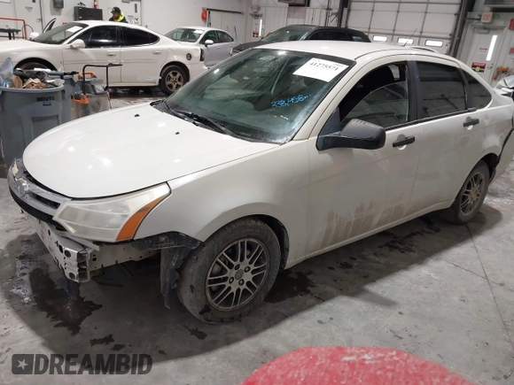 2010 Ford Focus SE with VIN 1FAHP3FN3AW190237, listed as a IAAI auction lot 41275571 with 338,458 mi miles. Bid and sale history available at carsss.com. Image 2.