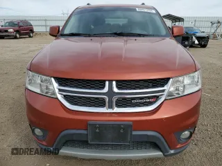 2013 Dodge Journey SXT with VIN 3C4PDCBG9DT710666, listed as a Copart auction lot 86851234 with 165,171 mi miles and Salvage title. Bid and sale history available at DreamBid. Image 5.