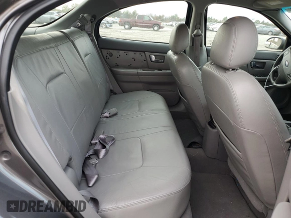 2002 Ford Taurus with VIN 1FAFP59S62A256119, listed as a Copart auction lot 79581164 with 57,128 mi miles and Clean title. Bid and sale history available at DreamBid. Image 10.