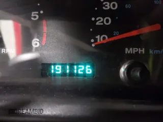 2002 Jeep Wrangler Sport with VIN 1J4FA49S02P704741, listed as a IAAI auction lot 41759558 with 191,126 mi miles. Bid and sale history available at carsss.com. Image 7.